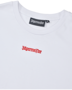 Cropped tee bianca con logo arancione Jägermeister.