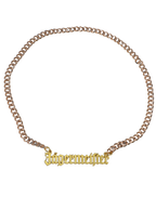 Collana con catena dorata e charm 'Jägermeister'.