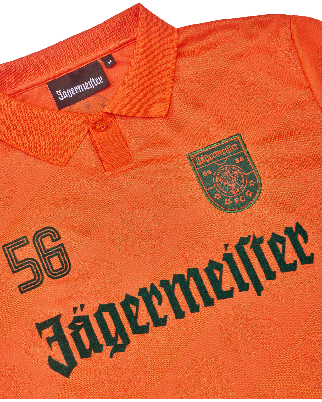 Jersey arancione con branding Jägermeister.