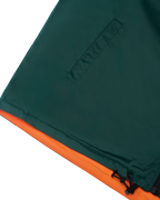 Tessuto verde e arancione della giacca reversibile Jägermeister