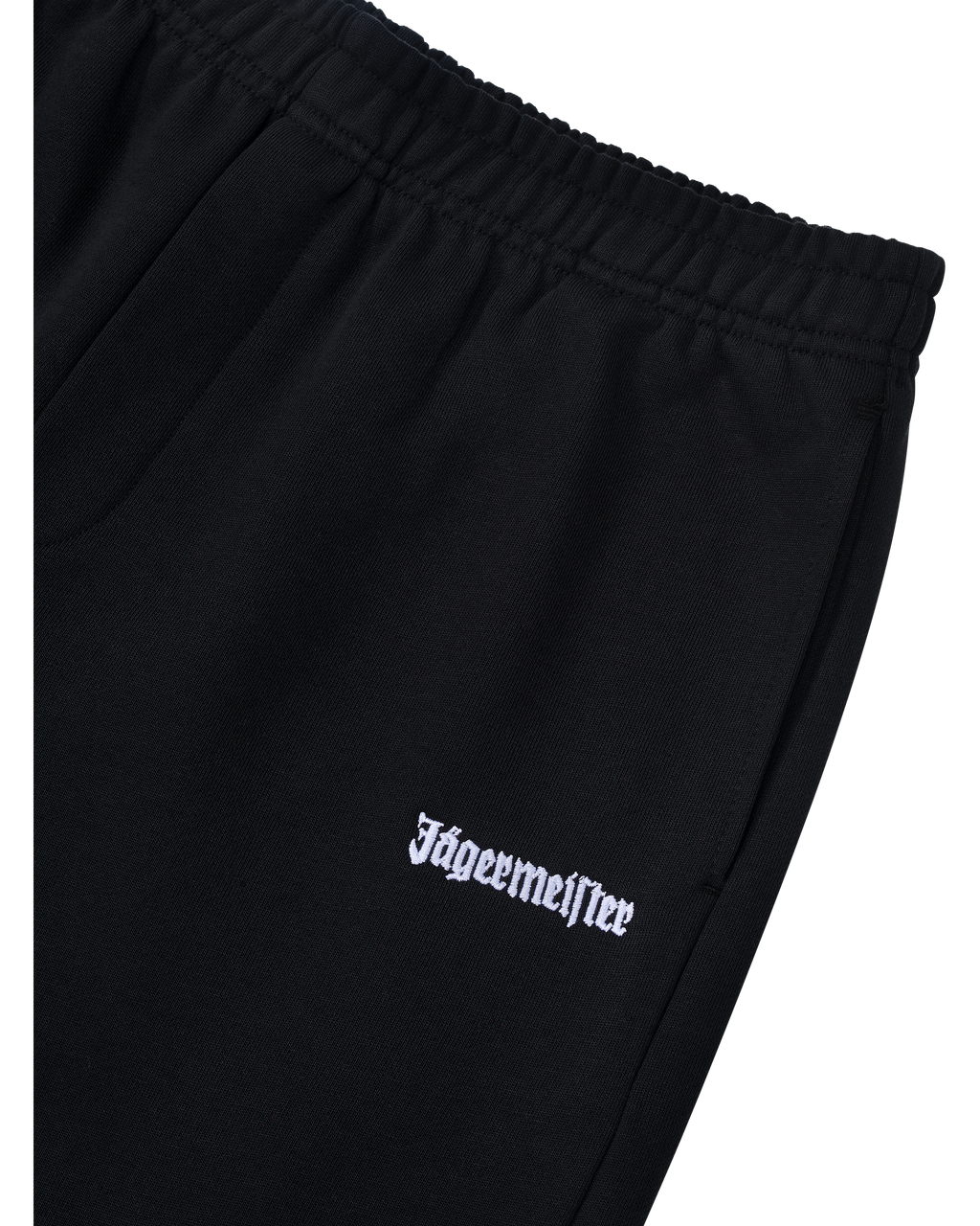 Pantaloni neri con logo bianco Jägermeister sul davanti.