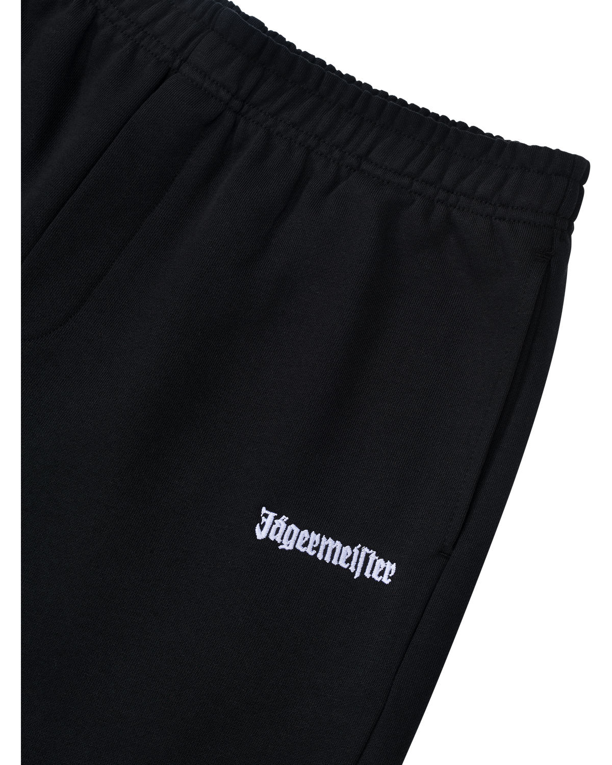 Pantaloni neri con logo bianco Jägermeister sul davanti.