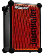 Speaker portatile Soundboks arancione e nero con branding 'Jägermeister'