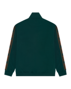 Giacca da tuta verde Jägermeister con strisce arancioni brandizzate sulle maniche.