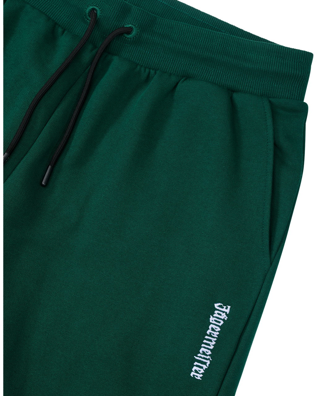 Pantaloni della tuta Jägermeister verdi con logo bianco.