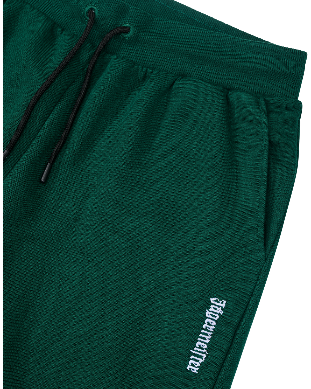 Pantaloni della tuta Jägermeister verdi con logo bianco.